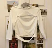 WHITE TURTLENECK W SLIT