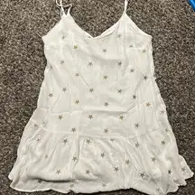 White mini dress with gold stars design