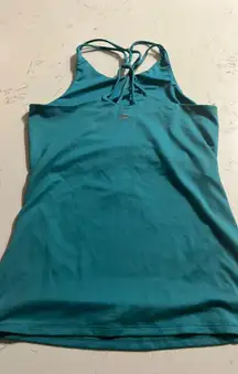 Teal tank top with cross back design 