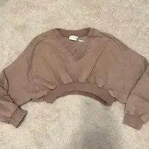 Out from under cropped sweatshirt!