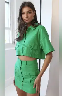 Showpo. NAVINE TWO PIECE SET - BUTTON FRONT CROP TOP AND CARGO POCKET MINI SKIRT