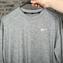 Nike  | women dry fit gray long sleeve athletic shirt with thumb holes