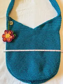 The Sak  Bucket Bag Turquoise Blue Crochet Crossbody Hobo Bag with Flower Charm