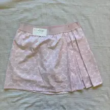 NWT Lady Hagen 16 inch Side pleated Pink and White Seashell golf skort.‎ Size M