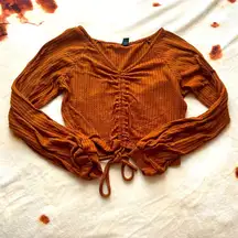 Brown long sleeved top