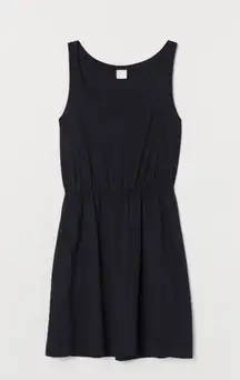 Sleeveless Little Black Jersey Dress w/  Elastic around Waistline Large NWOT