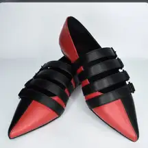 Strange Cvlt Coven flats in split black/red harlequin