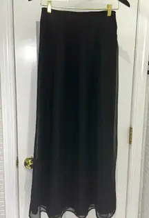 Elegant Drama Black tulle gored maxi skirt. Back zipper.Lined. Size 6.