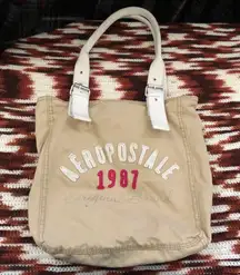 Y2K Aeropostale 1987 beige tan buckle shoulder hand tote bag purse. Great for school books laptops computers.
