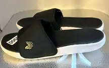 All in motion, size 9 black sandals with whitesoles. New with tags.​