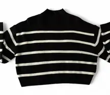 Dividend size small. Black and white striped long sleeve sweater.
