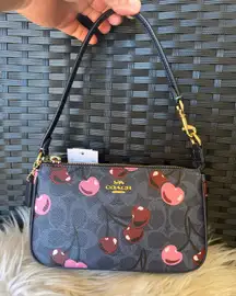 Coach Nolita 19 with cherry print