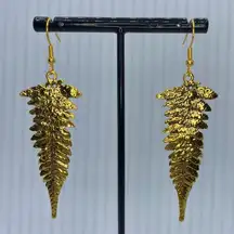 Gold fern earrings