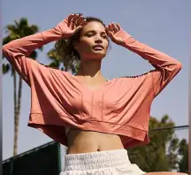 Free People Movement Orange Fearless long-sleeve cropped v-neck top athletic