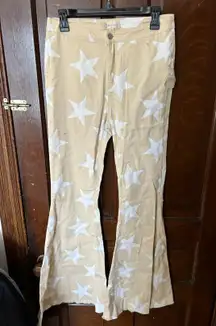 NWT Altar’d State Star Flare Jeans 