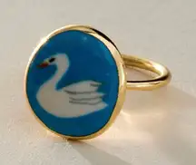 Free People Gold Ring with Blue and White Swan Design