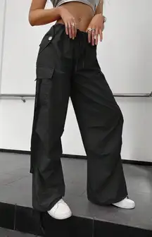 Black parachute pants