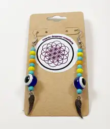 Evil eye earring with turquoise and sterling silver wing charm 