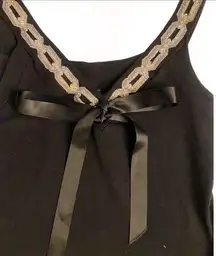 Kay Celine Black sleeveless sweater with beaded detail & bow‎