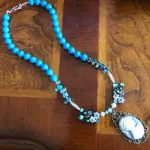 Handcrafted lady in blue mixed bead shell stone filigree cameo pendant necklace