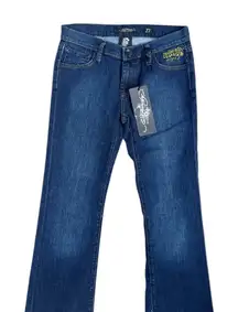 Ed Hardy denim jeans with an embroidered skull and roses