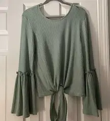 Bell- sleeved blouse