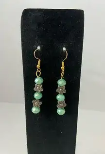 Mint green glass and flower bead earrings