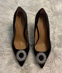 Very elegant Express high heel shoes size 10 brand new color black with silver