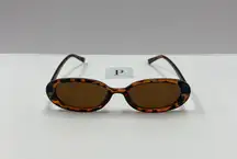90s style small oval leopard sunglasses 