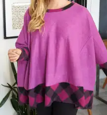 7. Pink and Black Fleecy Sweater with‎ Plaid Accents