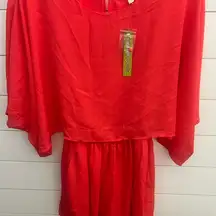 Gianni Bini dress/skort onesie 
Orange color size‎ XS
New with tags