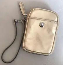 Coach  gold wristlet/accessory holder