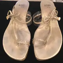 Stuart weitzman gold wedges with clear straps