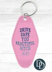 Drive‎ safe pink motel keychain