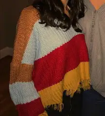 Colorblock striped red blue yellow ripped distressed sweater