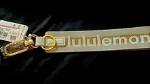 Lululemon Rare vpor/gold lulu never loose keychain