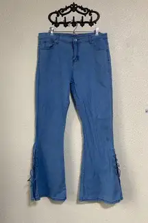 Lightweight Women’s‎ blue jeans, flared leg with tie details, size large