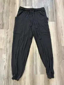 Size Small Gray Adjustable Lightweight Joggers with Pockets, waist is 14 with stretch to 16, inseam is 25