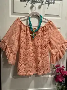 Modern Off Shoulder Lace Blouse Size M Bell Sleeve 100% Polyester. Flat measurements: Length 27” Width armpit to armpit 24” Sleeve Length 14”  Used - Like New.