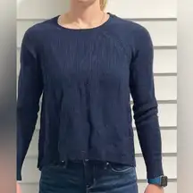 Navy sweater with brown leather elbow pads