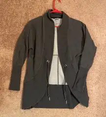 Champions sweater with tie in front. Lightly worn