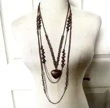 Cookie Lee wear several ways heart pendant multi chain necklace