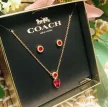 Coach necklace and earrings set in ruby red​​​​​​​