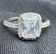 Ring- cubic zirconia, faux emerald cut diamond engagement ring. Size: 5