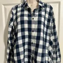 A blue and white button-up shirt with pockets, size medium.