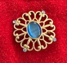 Gold and Blue Floral Brooch with Intricate Design