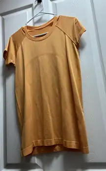 Light Orange Swiftly Tech Tee