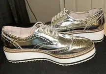 Shellys London mirror wingtip shoes