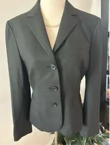 The limited black blazer size 4