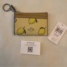NWT Coach Mini Skinny Id Case
With Lemon Print MSRP $82.99